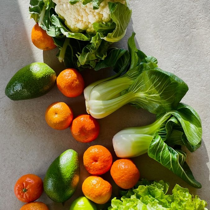fast-growing indoor vegetables growing in pots near window.