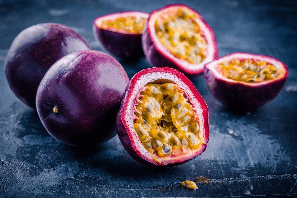 Passion fruit cut open showing seeds and pulp